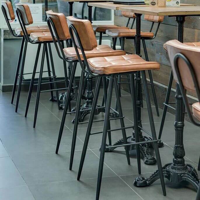 Tabouret de bar vintage en métal et revêtement PU